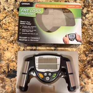 OMRON Fat Loss Monitor with Silver and Black Accents HBF-306C